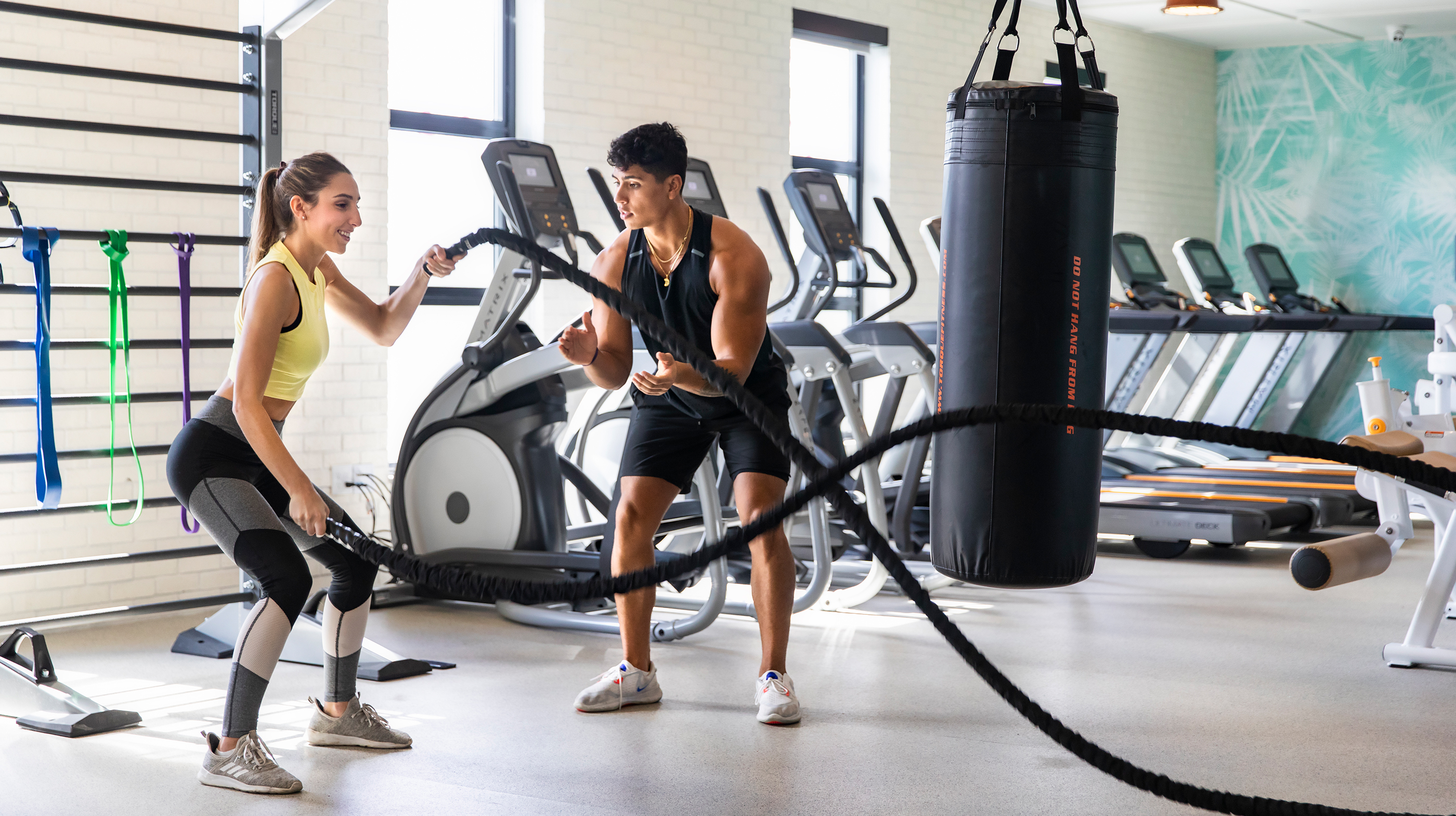 Friends exercising in a fitness center